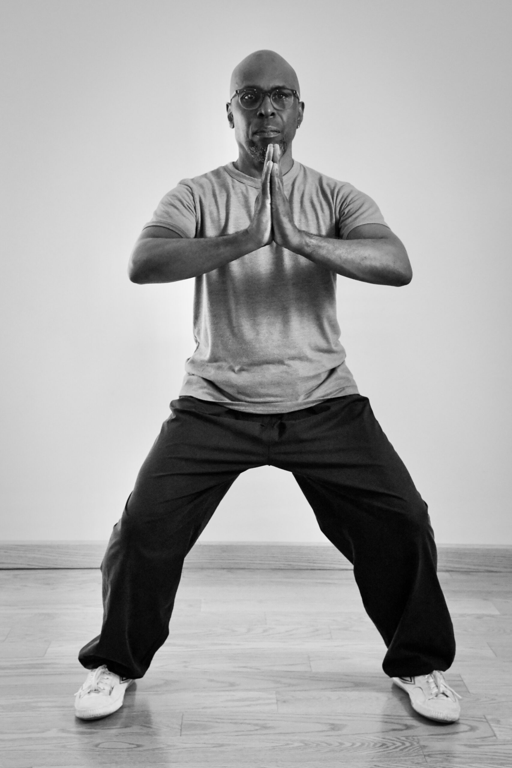 Qigong - Cultivating Flexibility and Healing Dondrub Wangchuk demonstrating a Qigong pose, promoting relaxation and mindfulness.