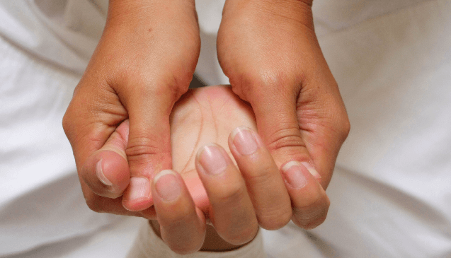 Hand Massage - Promoting Relaxation and Balance A close-up of a hand massage, emphasizing relaxation and energy flow.