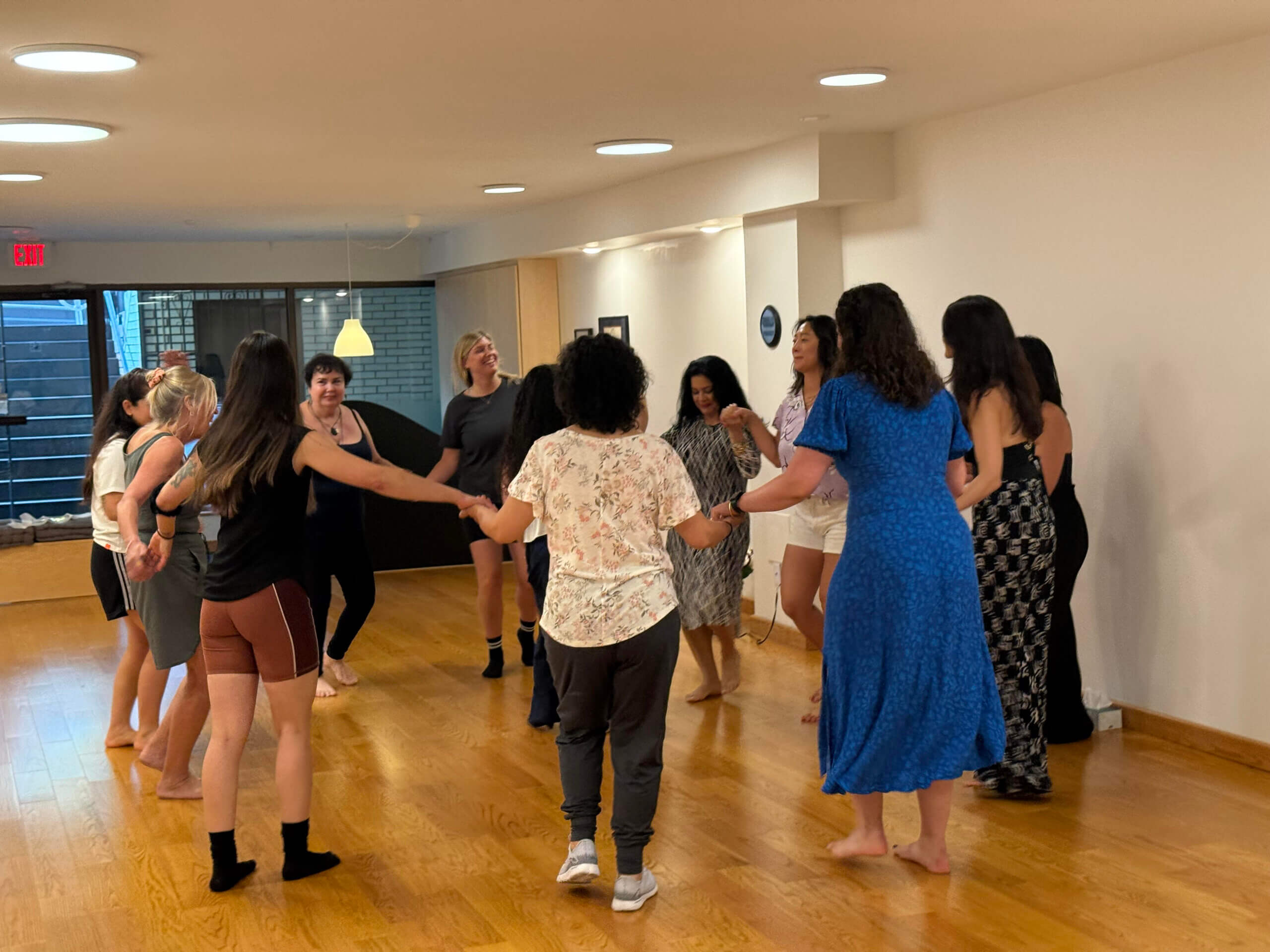 Students dancing Biodanza with Diana Ojeda, expressing emotion through movement.
