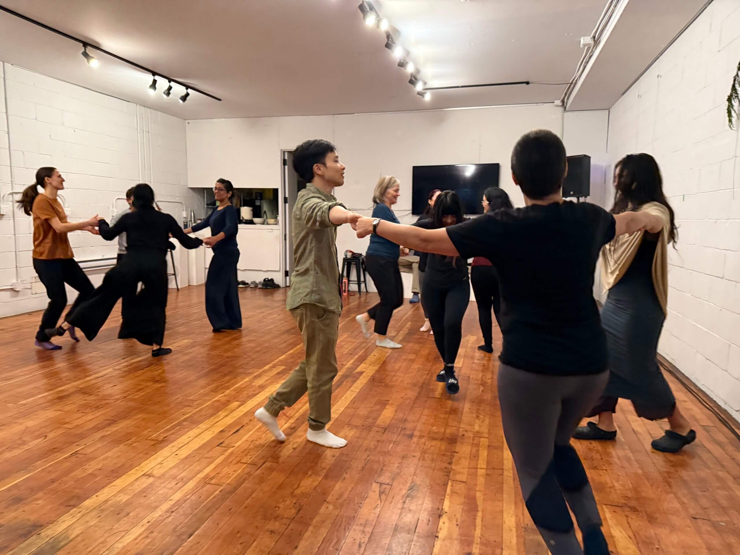 Students dancing Biodanza with Diana Ojeda, expressing emotion through movement.